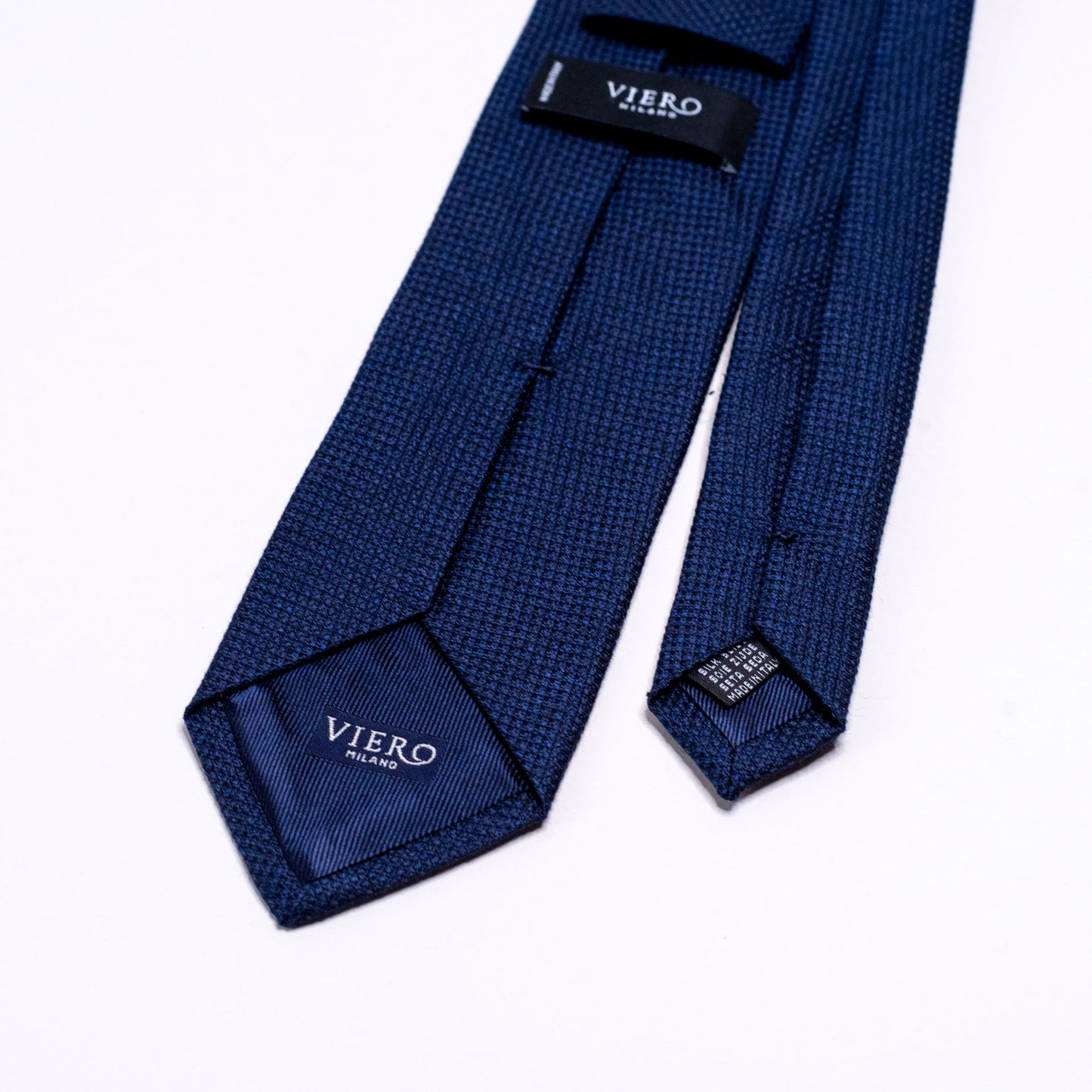 Slips, navy med svak struktur S24027