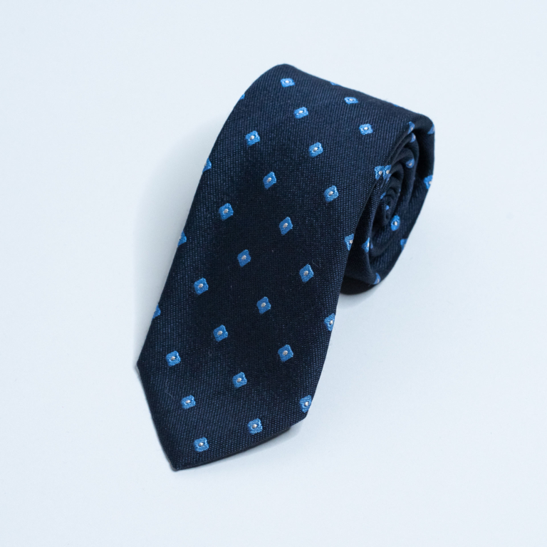 Mørkeblått slips i ull, silke og bomull. Made in italy.